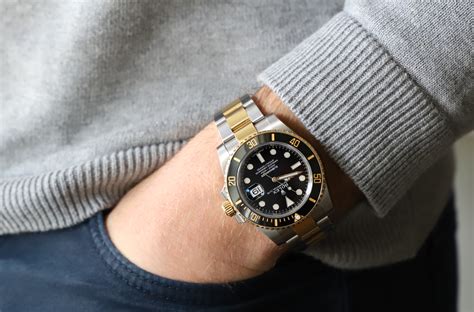 rolex submariner on wrist